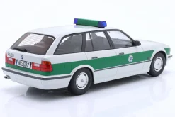 BMW 5er Serie E34 Touring Baujahr 1996 Polizei weiß / grün 1:18 Triple9