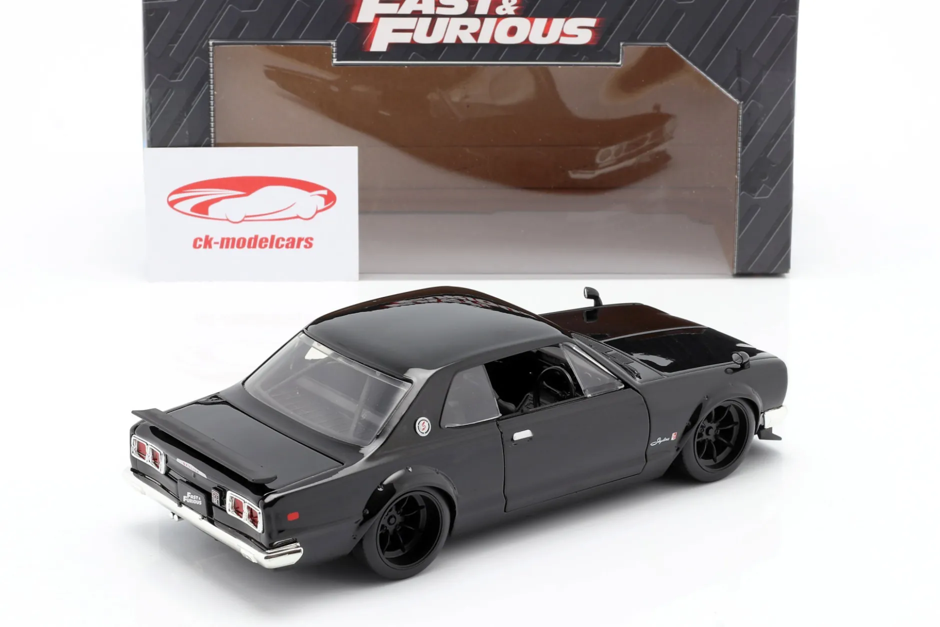 Brian's Nissan Skyline 2000 GTR Film Fast & Furious Five (2011) schwarz 1:24 Jada Toys
