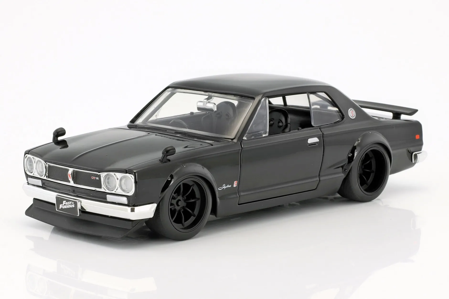 Brian's Nissan Skyline 2000 GTR Film Fast & Furious Five (2011) schwarz 1:24 Jada Toys