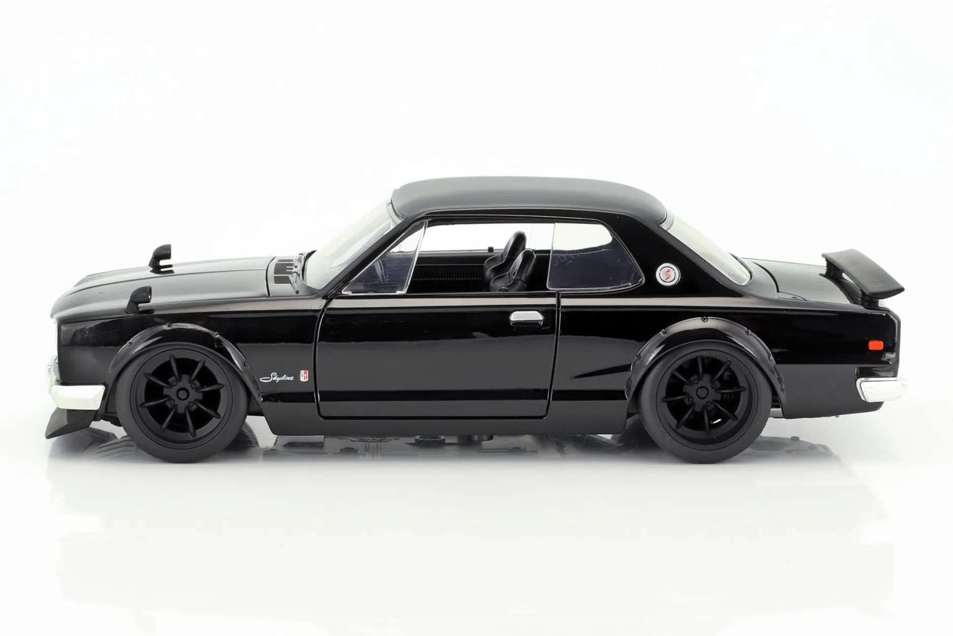 Brian's Nissan Skyline 2000 GTR Film Fast & Furious Five (2011) schwarz 1:24 Jada Toys