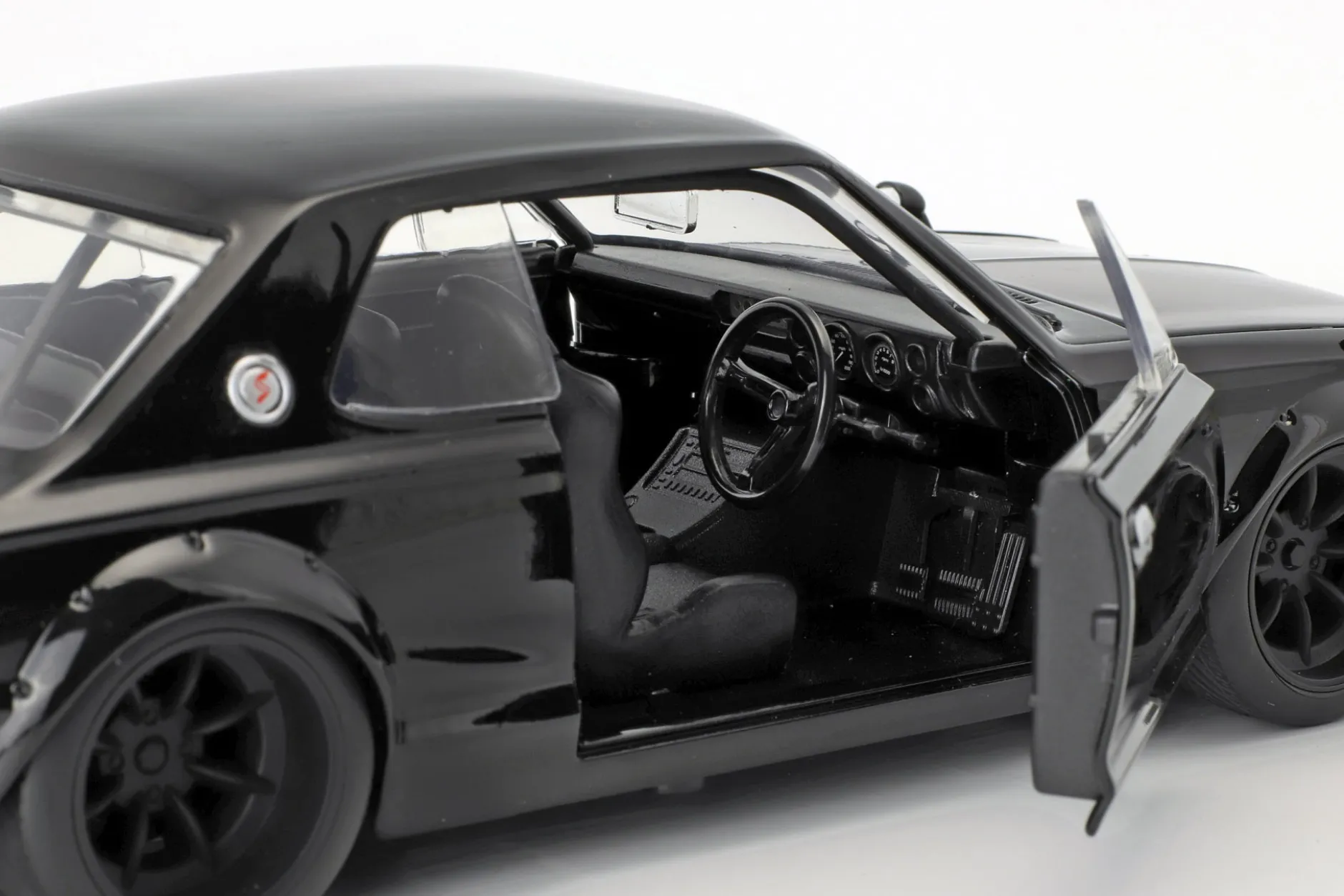 Brian's Nissan Skyline 2000 GTR Film Fast & Furious Five (2011) schwarz 1:24 Jada Toys