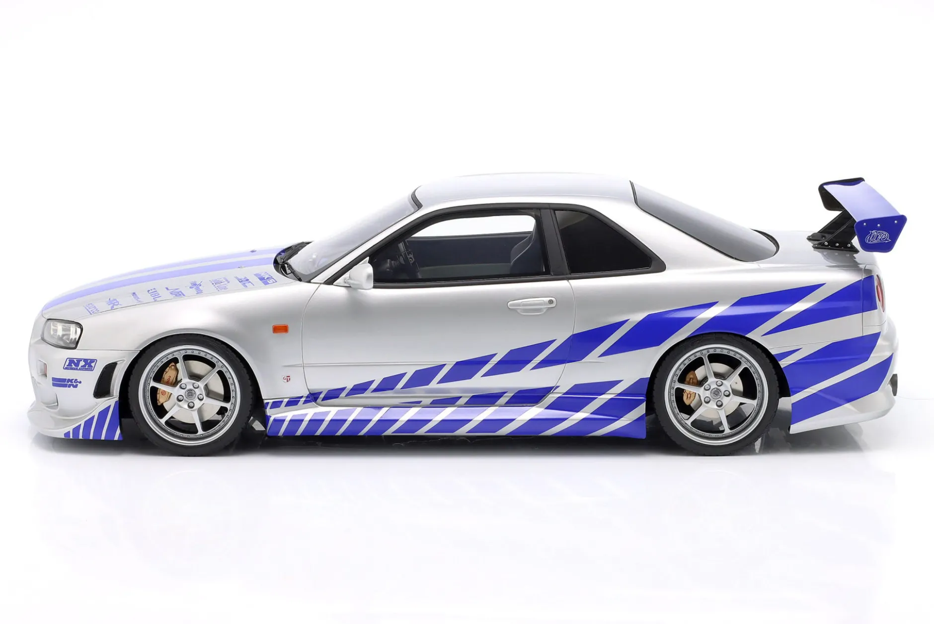 Brian's Nissan Skyline GT-R (R34) Film 2 Fast 2 Furious (2003) silber / blau 1:12 Kyosho