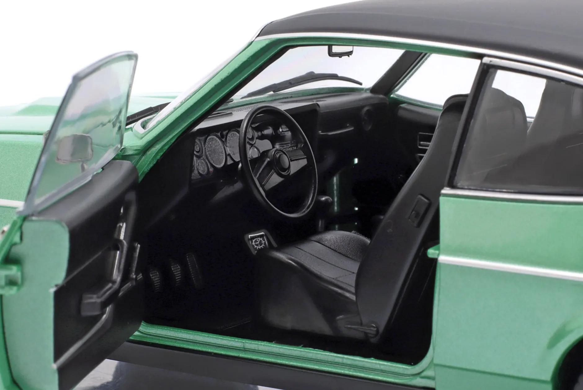 Ford Capri II Ghia 3.0 Baujahr 1974-1977 mittelmeergrün 1:18 TOURING