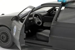 Ford Taurus OCP Baujahr 1986 Movie Robocop (1987) mit Figur 1:24 Jada Toys