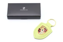 Leder-Schlüsselanhänger Porsche Wappen cartagenagelb metallic