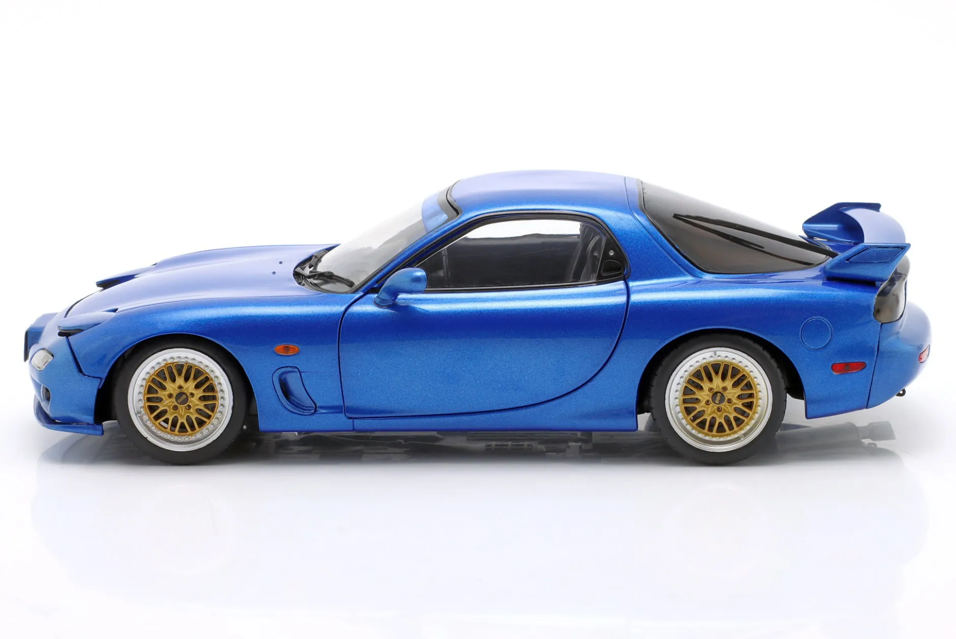 Mazda RX-7 Typ RS (FD3S) Baujahr 1999 blau metallic 1:18 Solido