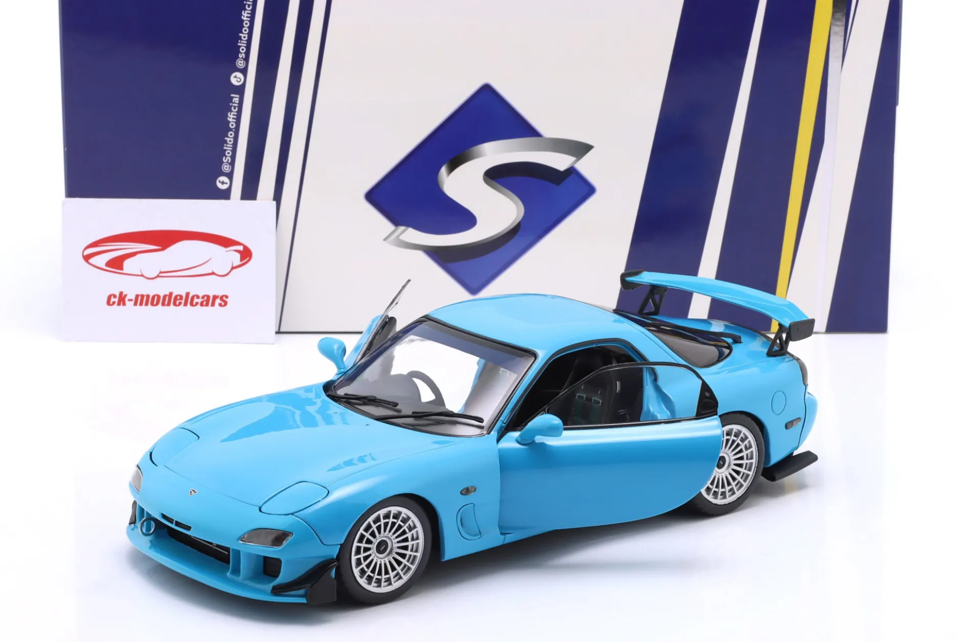 Mazda RX-7 Typ RS (FD3S) Baujahr 1999 neonblau 1:18 Solido