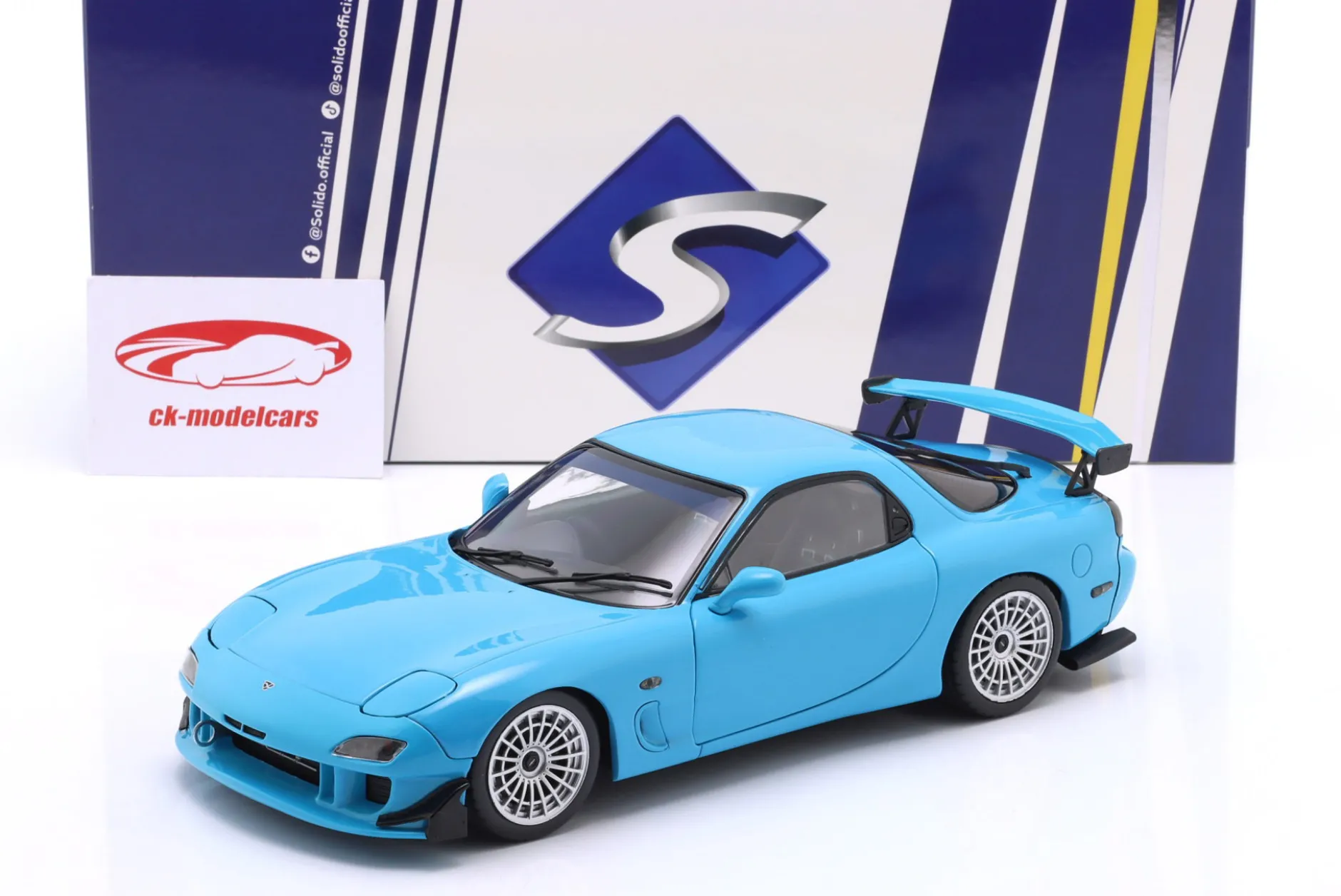 Mazda RX-7 Typ RS (FD3S) Baujahr 1999 neonblau 1:18 Solido