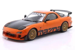 Mazda RX-7 Typ RS (FD3S) Baujahr 1999 orange / schwarz 1:18 Solido