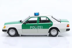 Mercedes-Benz 230E (W124) Polizei Baujahr 1989-1993 weiß / grün 1:18 Norev