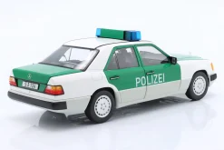 Mercedes-Benz 230E (W124) Polizei Baujahr 1989-1993 weiß / grün 1:18 Norev