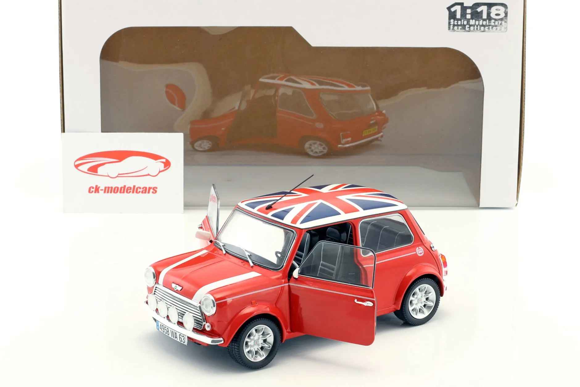 Mini Cooper 1.3i Sport Pack Baujahr 1997 rot mit Union Jack 1:18 Solido