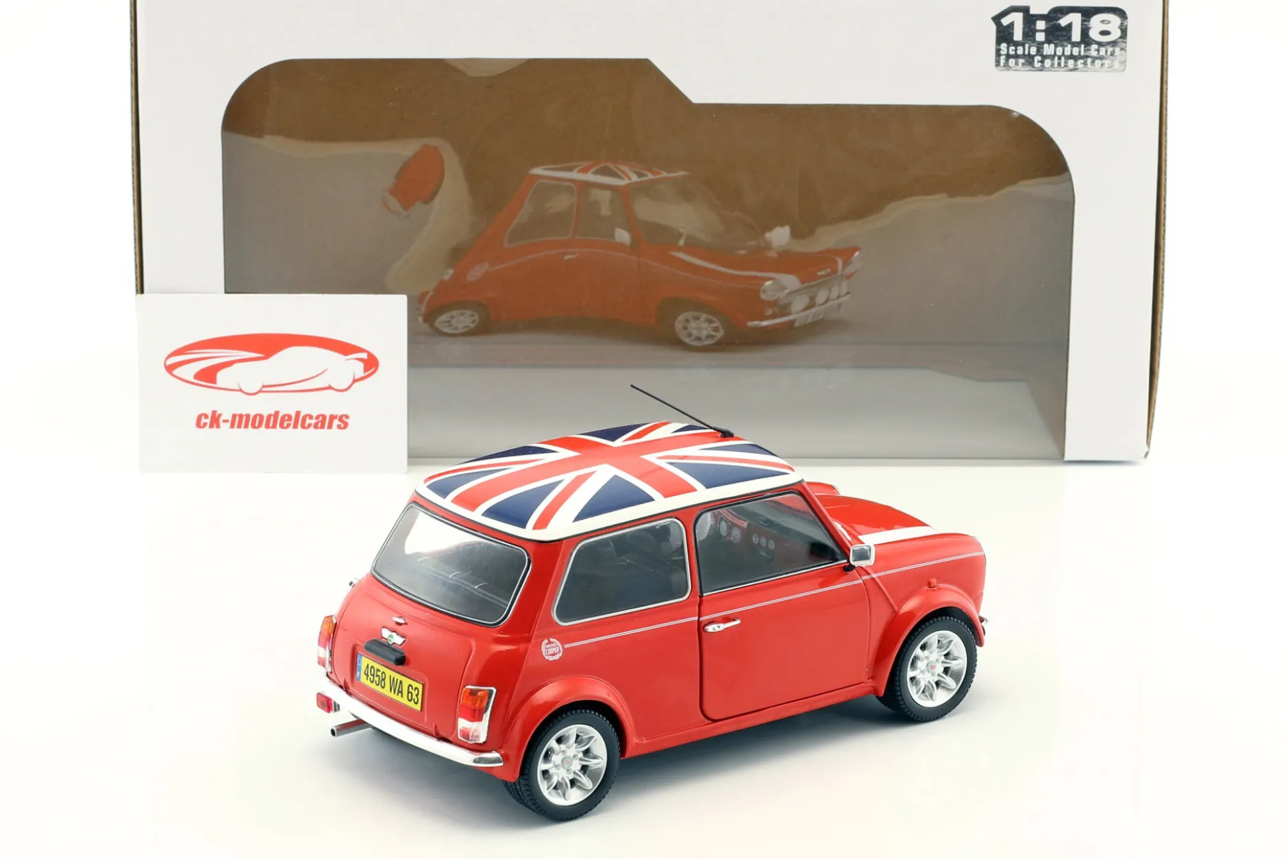 Mini Cooper 1.3i Sport Pack Baujahr 1997 rot mit Union Jack 1:18 Solido