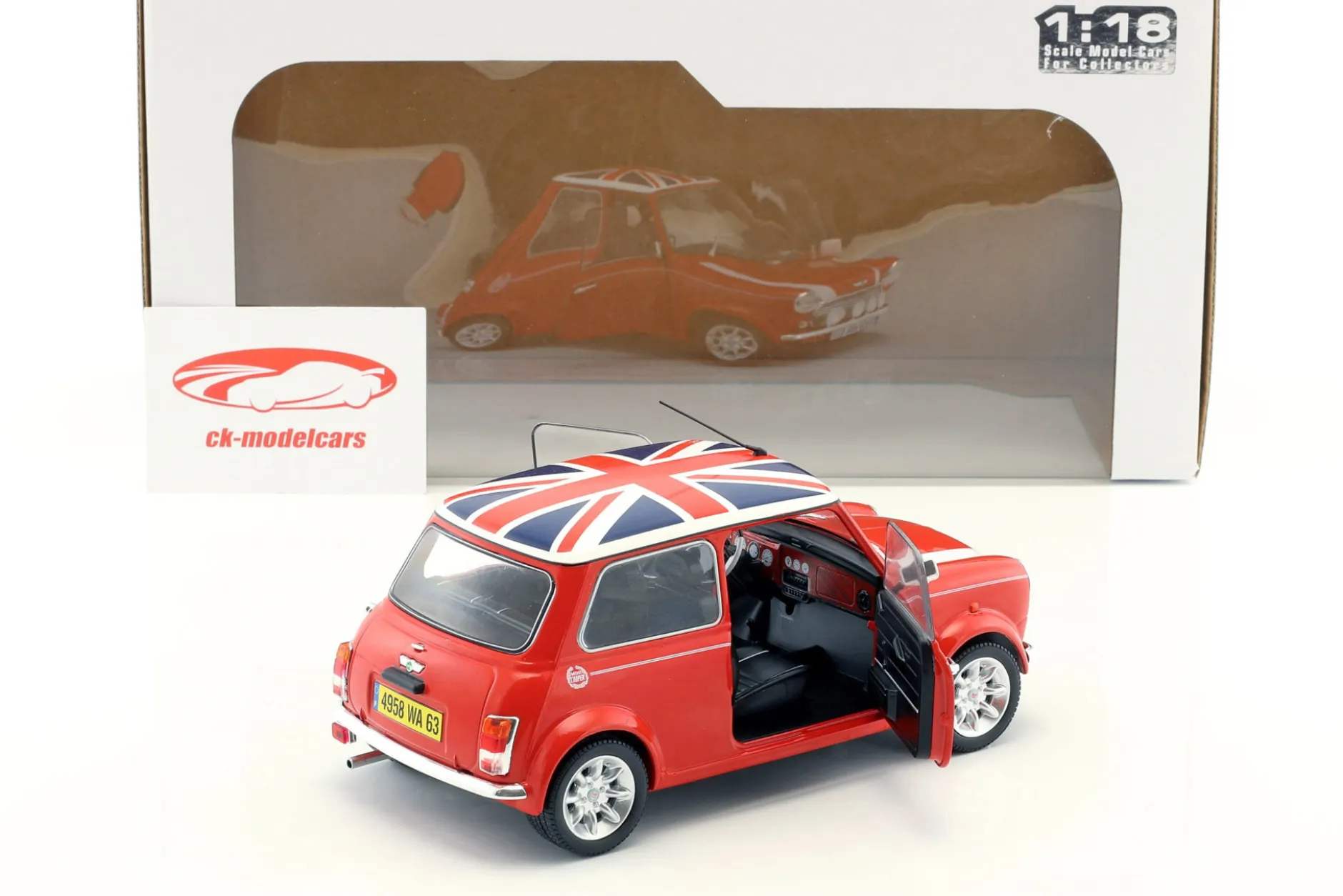 Mini Cooper 1.3i Sport Pack Baujahr 1997 rot mit Union Jack 1:18 Solido