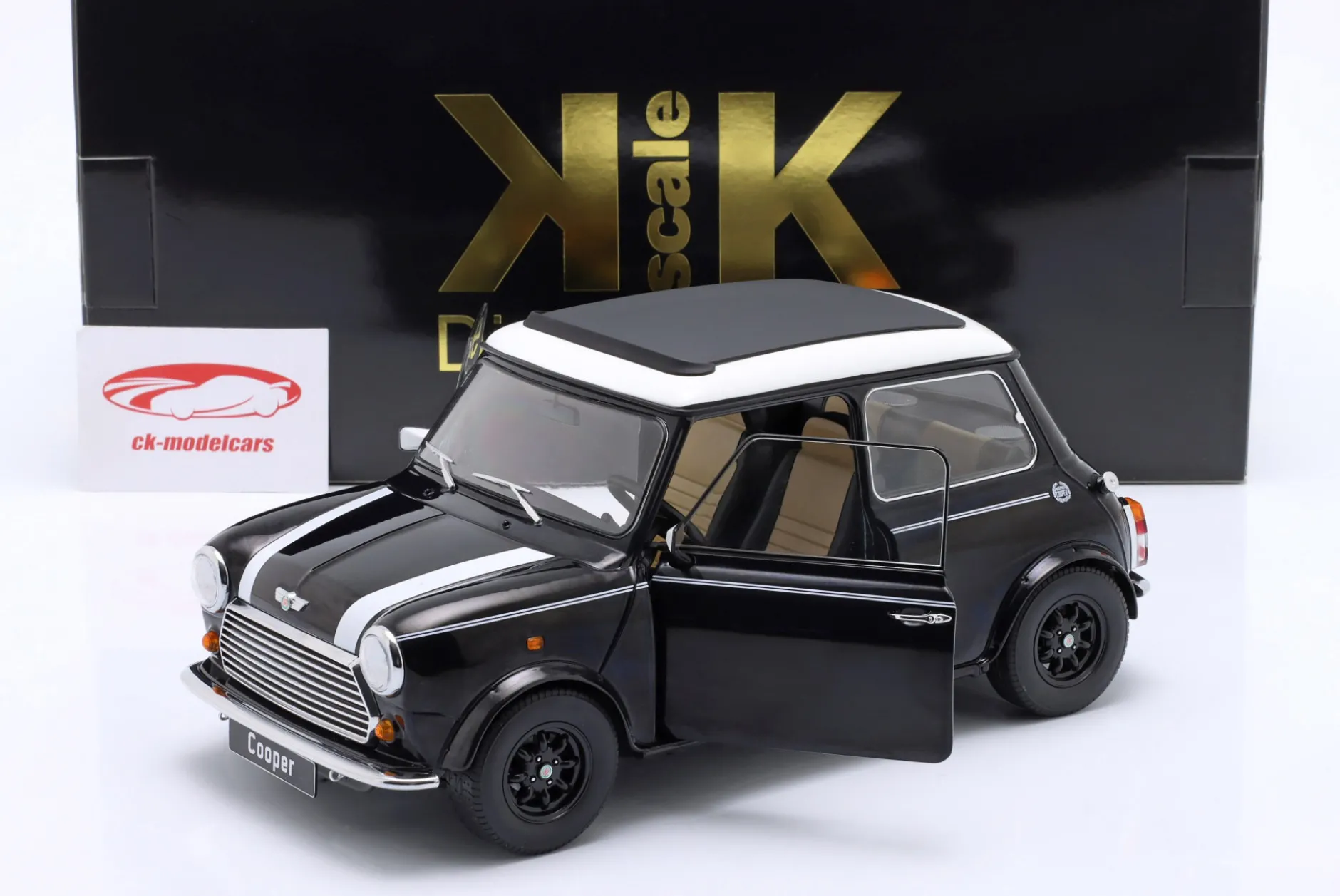 Mini Cooper mit Schiebedach schwarz metallic / weiß LHD 1:12 KK-Scale