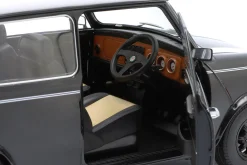 Mini Cooper mit Schiebedach schwarz metallic / weiß RHD 1:12 KK-Scale