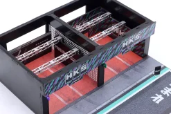 Motorsport Pit Garage HKS schwarz / grün / lila 1:64 Tarmac Works