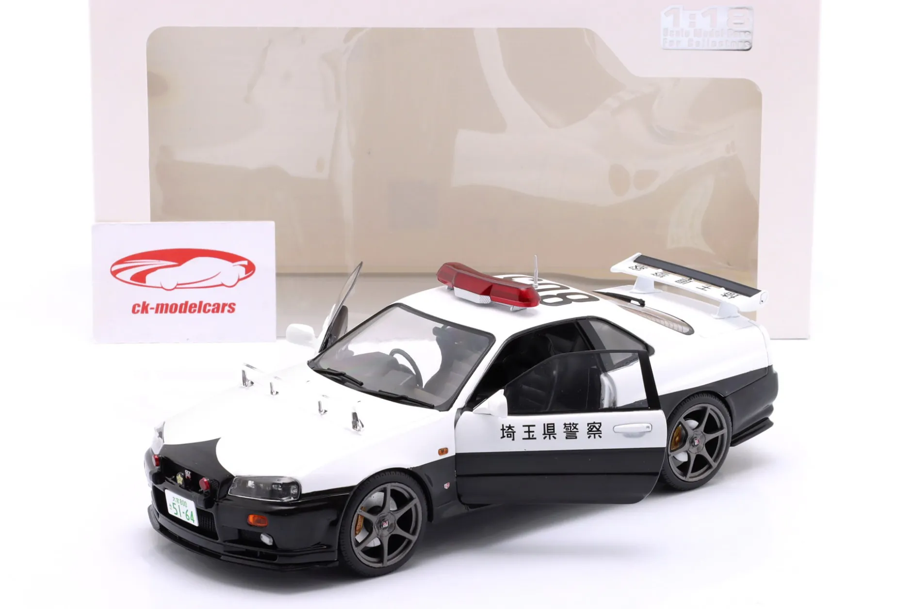 Nissan Skyline GT-R Polizei Japan Baujahr 1999 weiß 1:18 Solido