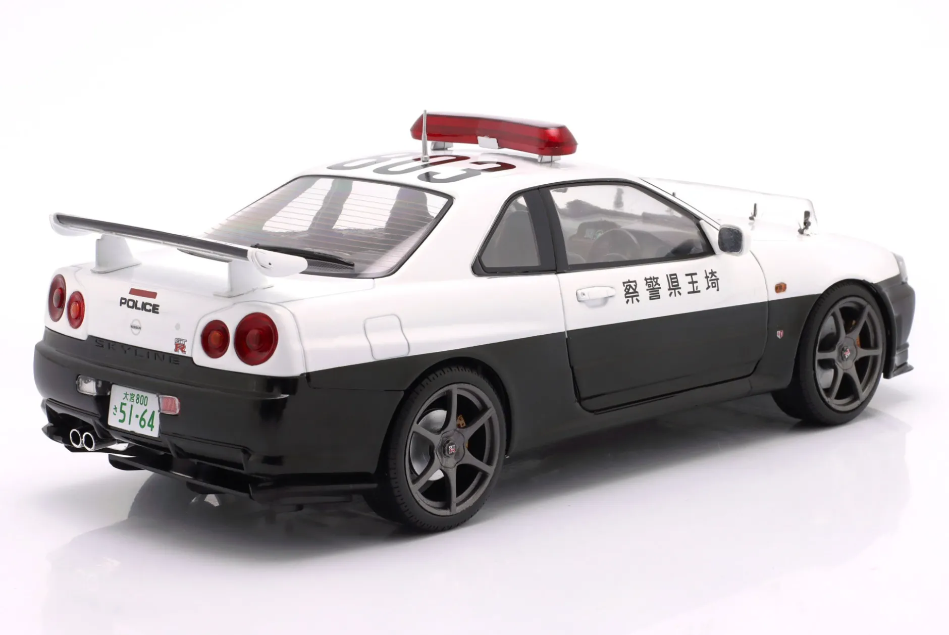 Nissan Skyline GT-R Polizei Japan Baujahr 1999 weiß 1:18 Solido
