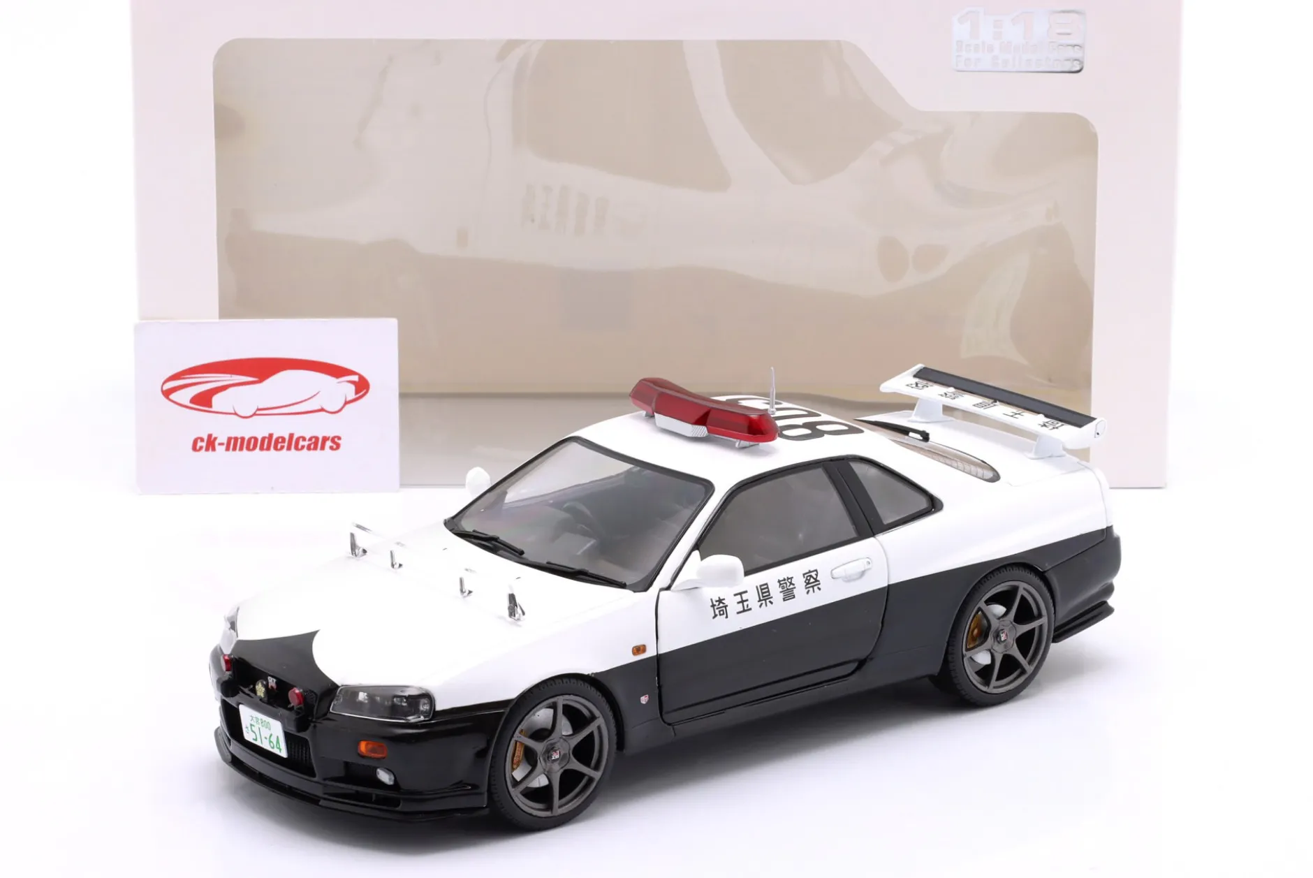 Nissan Skyline GT-R Polizei Japan Baujahr 1999 weiß 1:18 Solido
