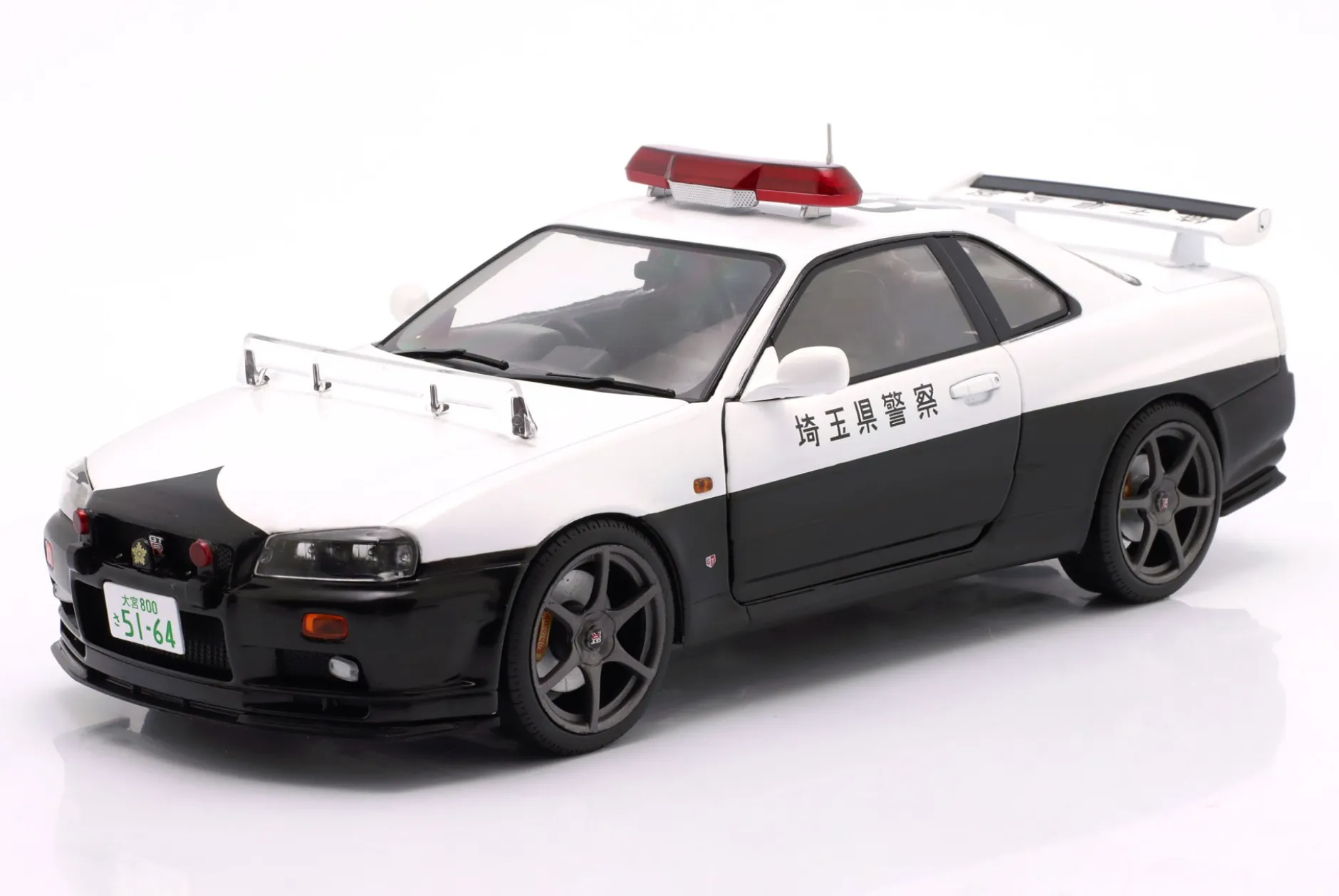 Nissan Skyline GT-R Polizei Japan Baujahr 1999 weiß 1:18 Solido