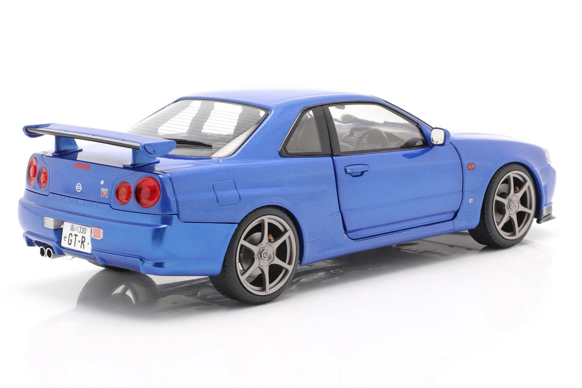 Nissan Skyline GT-R (R34) Baujahr 1999 bayside blau 1:18 Solido