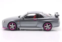 Nissan Skyline GT-R (R34) Baujahr 1999 silbergrau metallic / lila 1:18 Solido