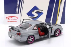 Nissan Skyline GT-R (R34) Baujahr 1999 silbergrau metallic / lila 1:18 Solido