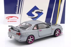 Nissan Skyline GT-R (R34) Baujahr 1999 silbergrau metallic / lila 1:18 Solido