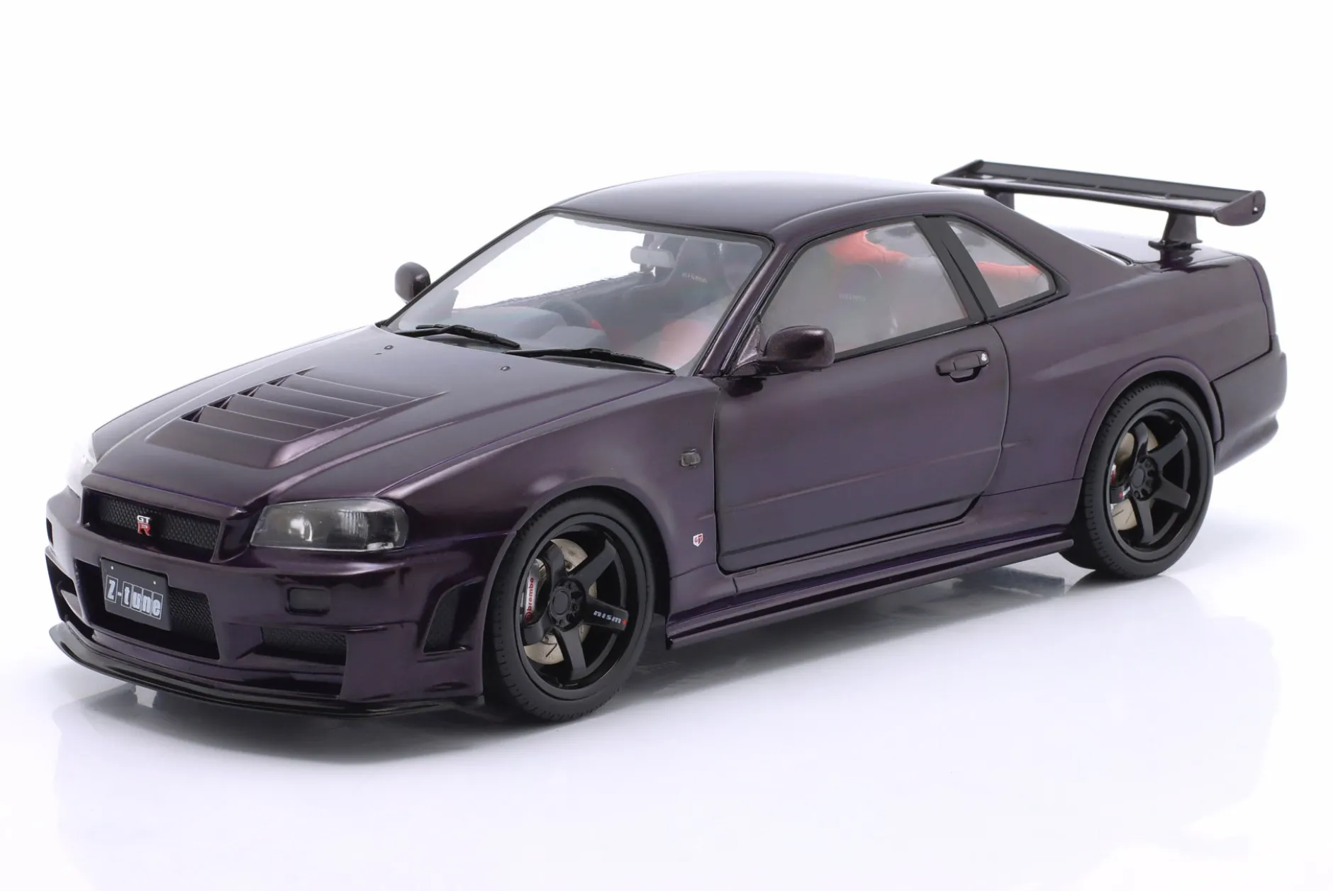 Nissan Skyline (R34) GT-R Z Tune Baujahr 1999 lila 1:18 Solido