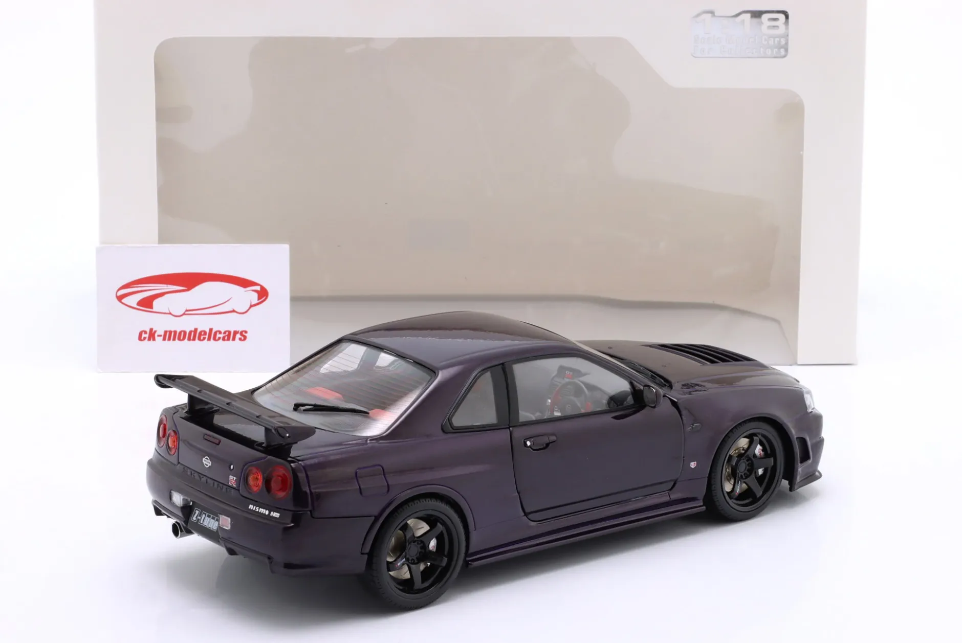 Nissan Skyline (R34) GT-R Z Tune Baujahr 1999 lila 1:18 Solido