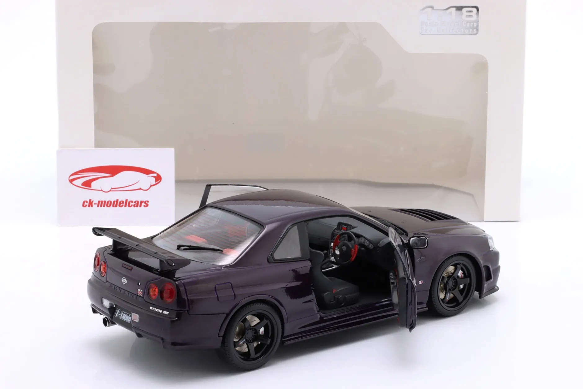 Nissan Skyline (R34) GT-R Z Tune Baujahr 1999 lila 1:18 Solido