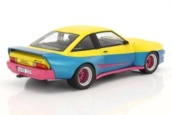 Opel Manta B Mattig Film Manta Manta (1991) gelb / blau metallic / rosa 1:18 ModelCar Group
