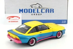 Opel Manta B Mattig Film Manta Manta (1991) gelb / blau metallic / rosa 1:18 ModelCar Group