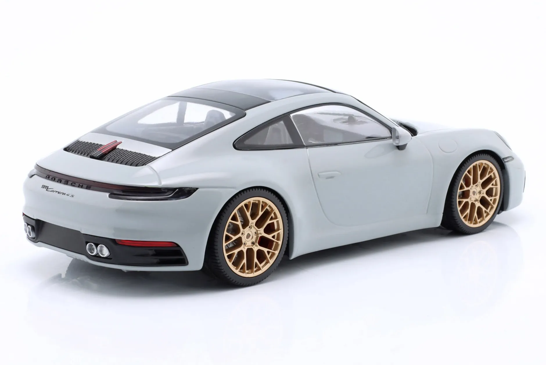 Porsche 911 (992) Carrera 4S 2023 kreide / goldene Felgen 1:18 Minichamps