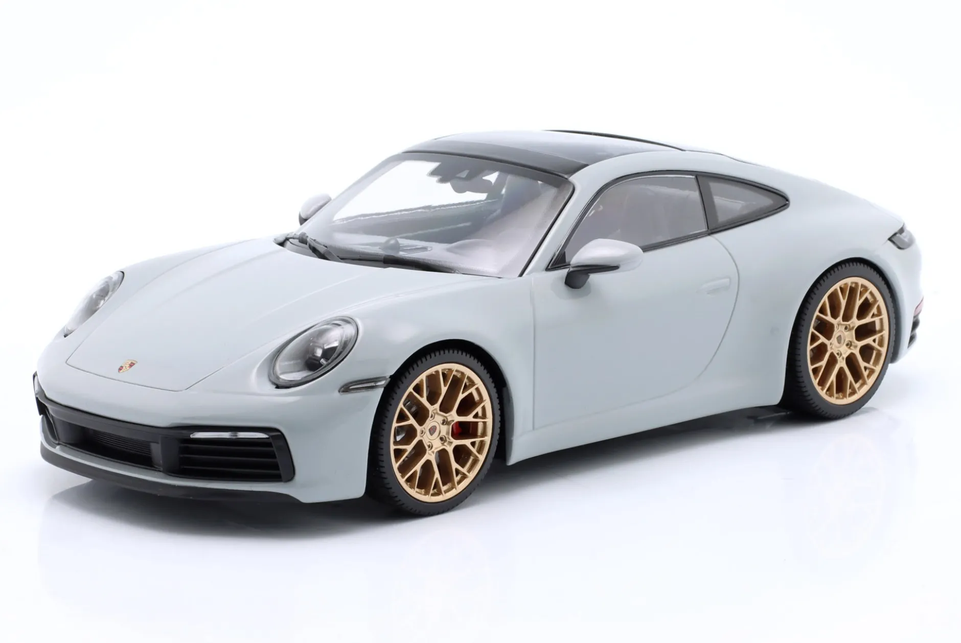 Porsche 911 (992) Carrera 4S 2023 kreide / goldene Felgen 1:18 Minichamps