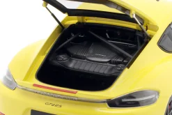 Porsche Cayman GT4 RS mit Weissach-Paket Baujahr 2024 gelb 1:18 Minichamps