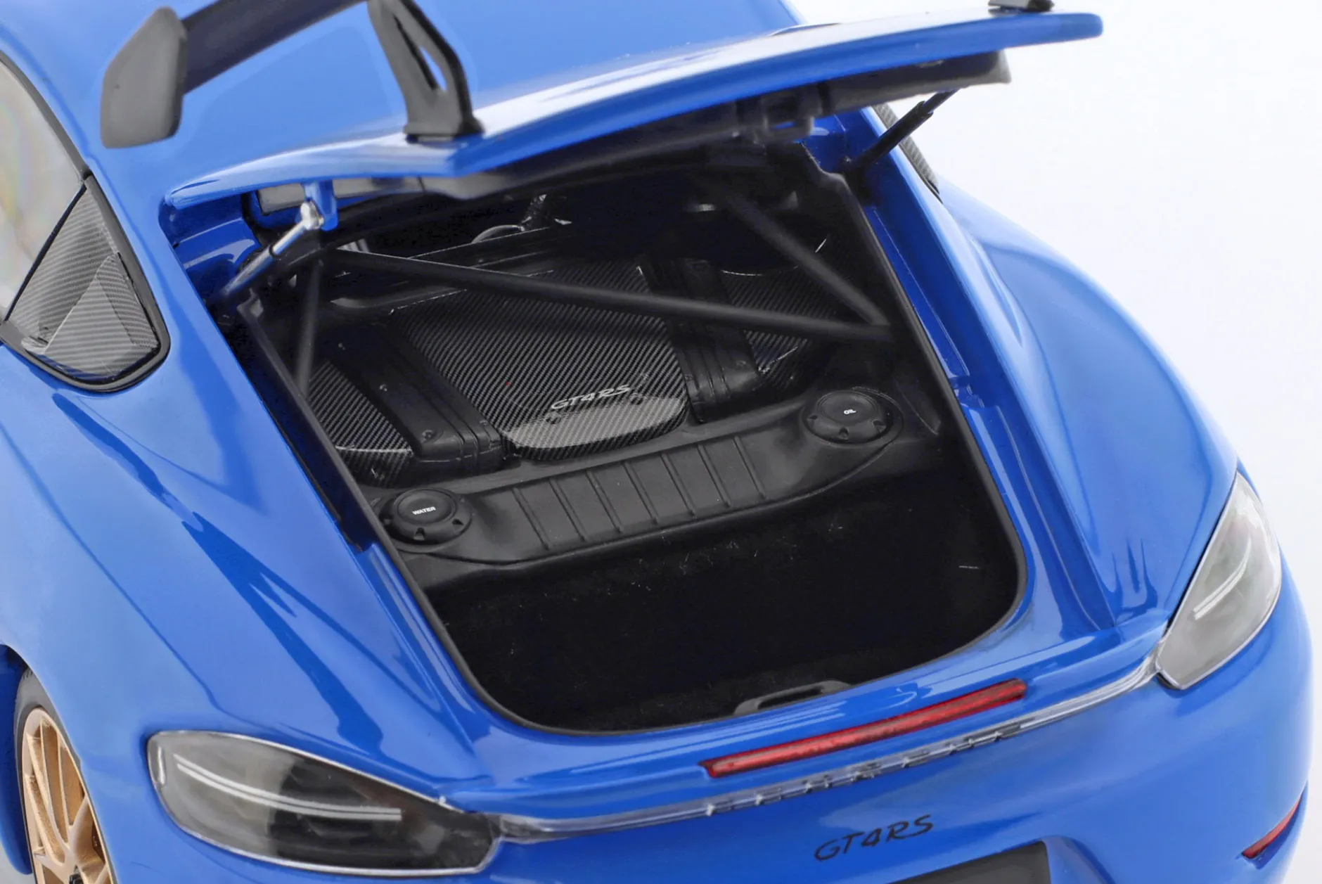 Porsche Cayman GT4 RS mit Weissach-Paket Baujahr 2024 blau 1:18 Minichamps