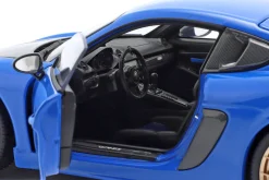 Porsche Cayman GT4 RS mit Weissach-Paket Baujahr 2024 blau 1:18 Minichamps