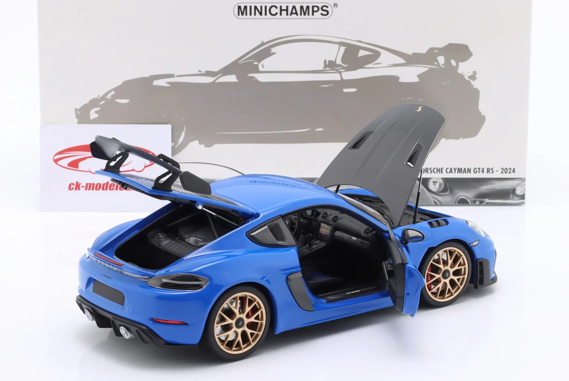 Porsche Cayman GT4 RS mit Weissach-Paket Baujahr 2024 blau 1:18 Minichamps
