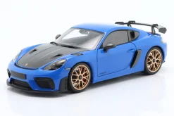 Porsche Cayman GT4 RS mit Weissach-Paket Baujahr 2024 blau 1:18 Minichamps