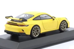 Porsche 911 (992) GT3 Baujahr 2020 racinggelb / goldene Felgen 1:43 Minichamps