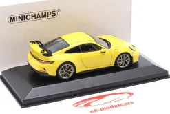 Porsche 911 (992) GT3 Baujahr 2020 racinggelb / goldene Felgen 1:43 Minichamps