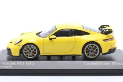 Porsche 911 (992) GT3 Baujahr 2020 racinggelb / goldene Felgen 1:43 Minichamps