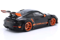 Porsche 911 (992) GT3 RS Baujahr 2022 schwarz / orange Felgen 1:18 Minichamps