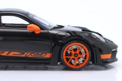 Porsche 911 (992) GT3 RS Baujahr 2022 schwarz / orange Felgen 1:18 Minichamps