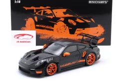 Porsche 911 (992) GT3 RS Baujahr 2022 schwarz / orange Felgen 1:18 Minichamps