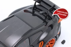 Porsche 911 (992) GT3 RS Baujahr 2022 schwarz / orange Felgen 1:18 Minichamps