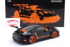 Porsche 911 (992) GT3 RS Baujahr 2022 schwarz / orange Felgen 1:18 Minichamps
