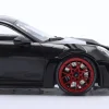Porsche 911 (992) GT3 RS Baujahr 2023 schwarz / rote Felgen 1:18 Minichamps
